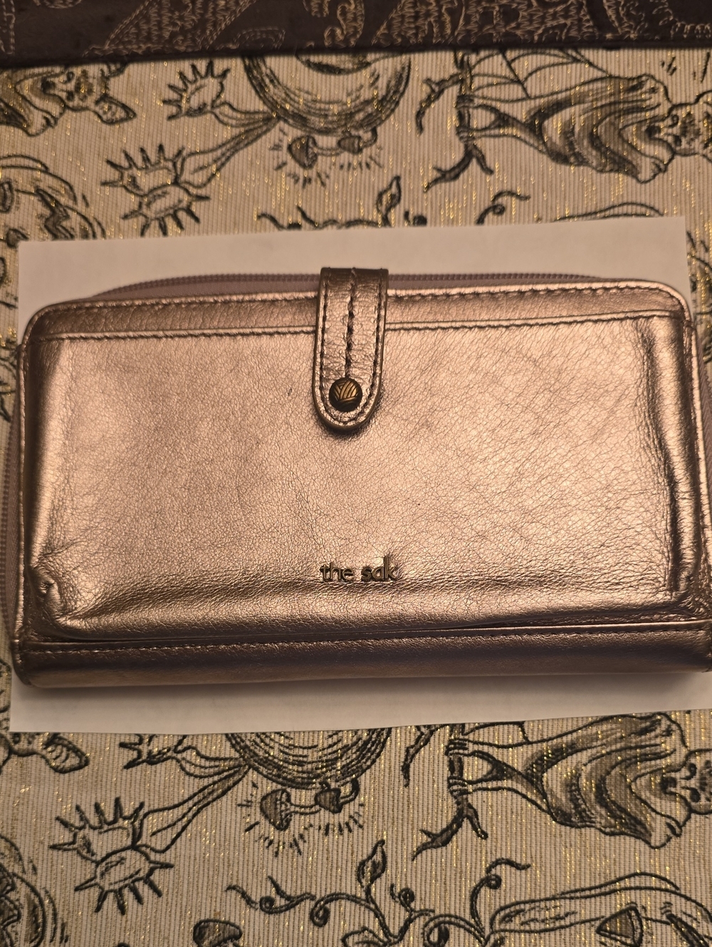 The Sak Metallic Rose Gold Leather Wallet